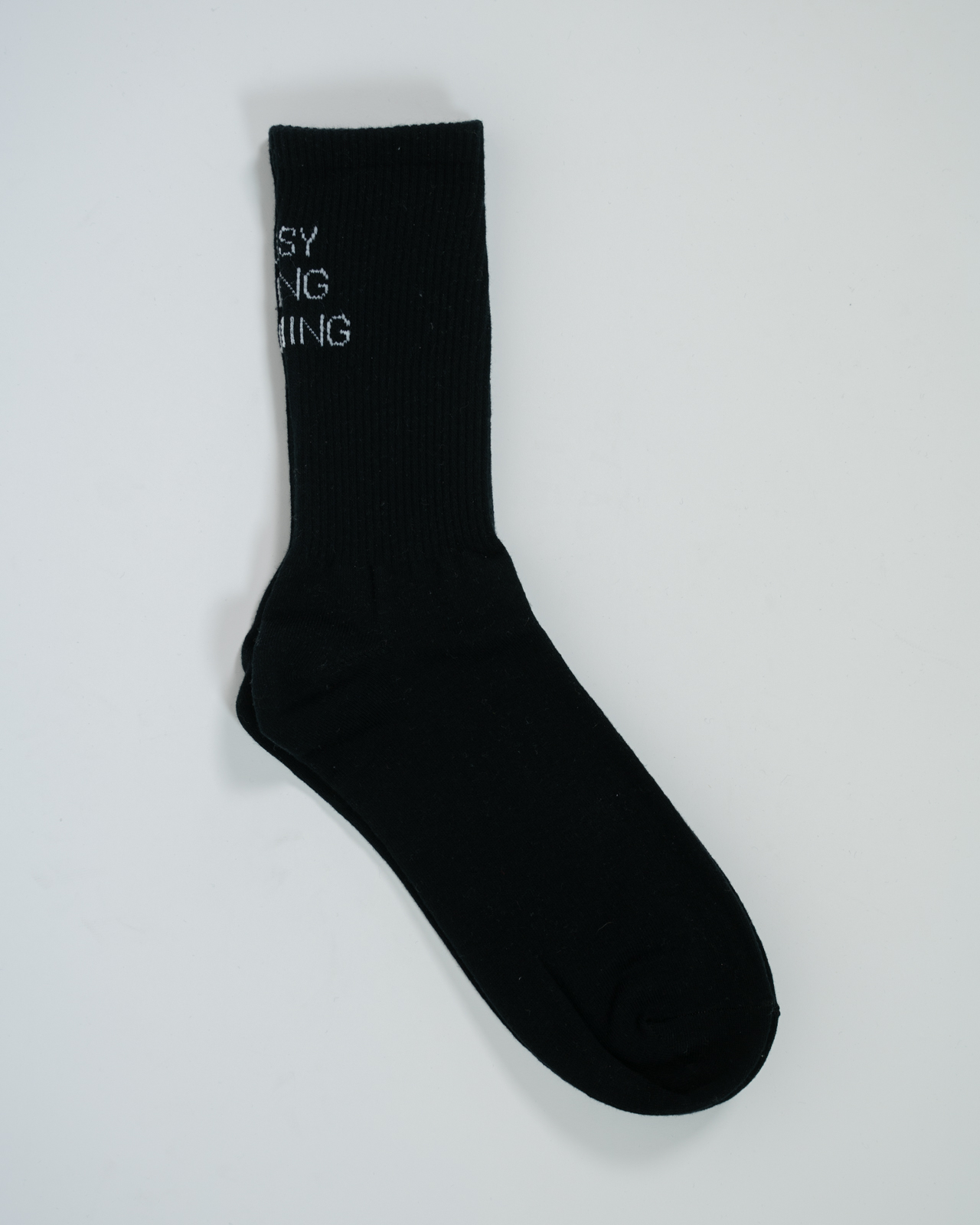 Varianten: BUSY DOING NOTHING Socken Schwarz